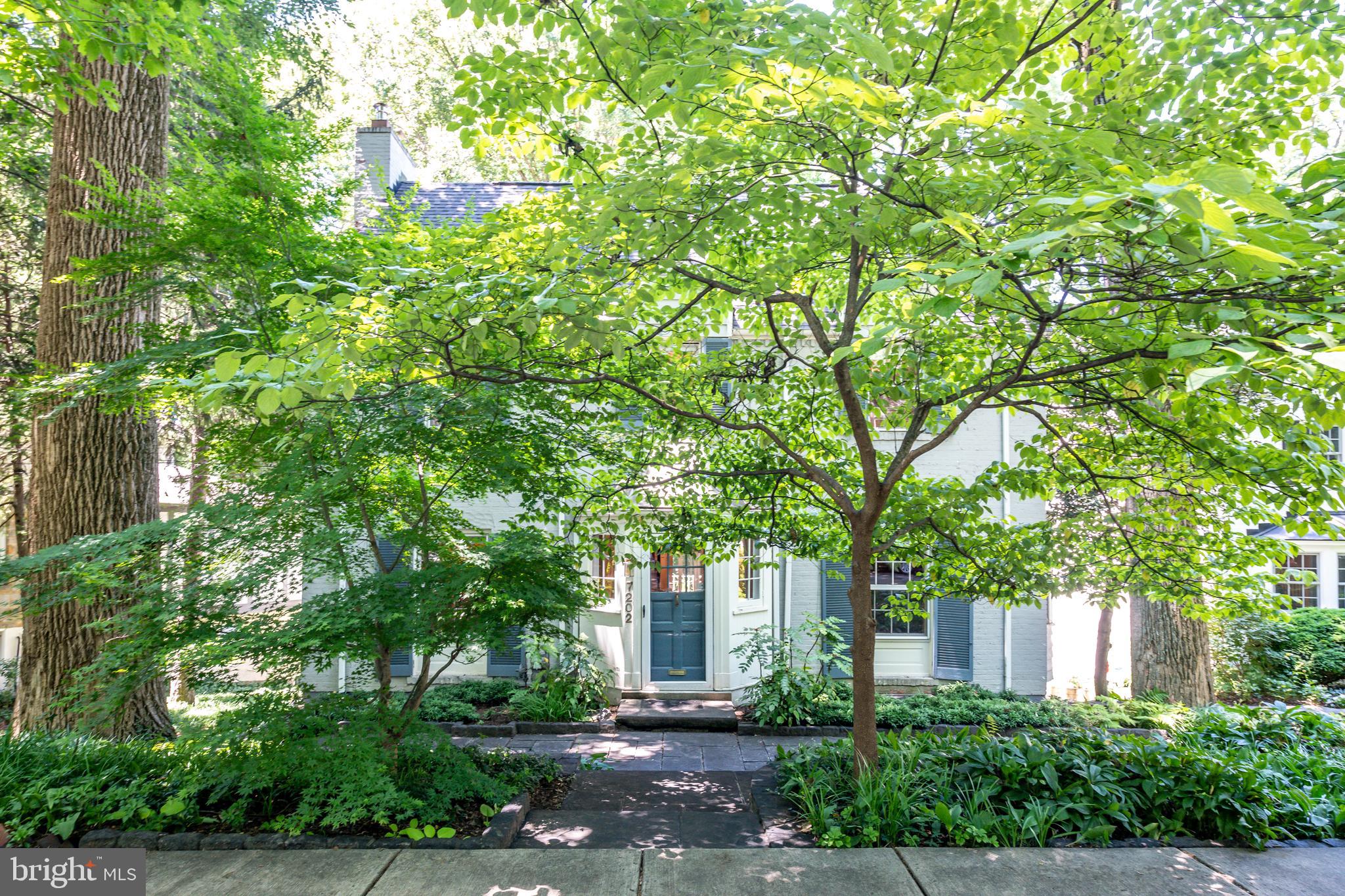 7202 Maple Avenue Chevy Chase, MD 20815 - Photo 2 of 10 Nestled behind lush trees providing privacy