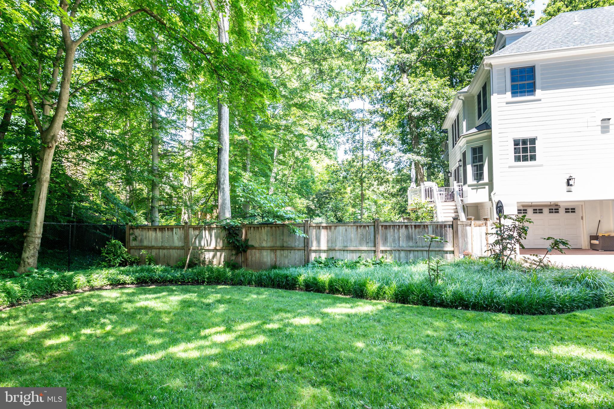 7202 Maple Avenue Chevy Chase, MD 20815 - Photo 8 of 10 Lush lawn and privacy fence