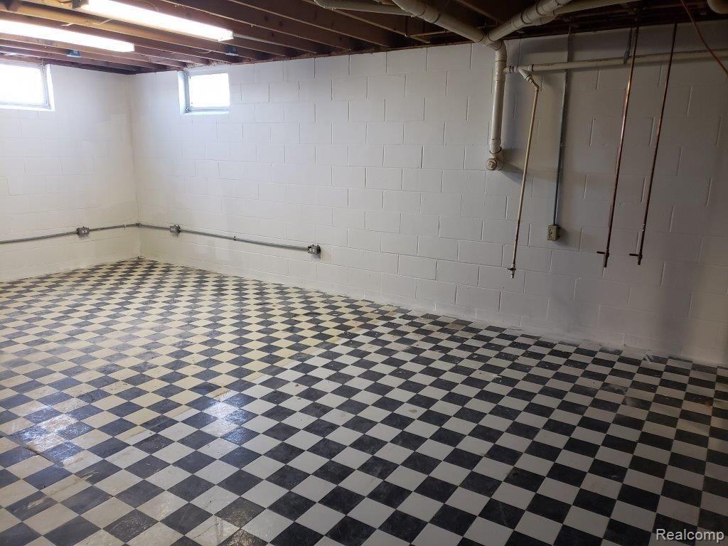 2083 East Hunters Creek Road Metamora, MI 48455 - Photo 17 of 29 Open Unfinished Basement