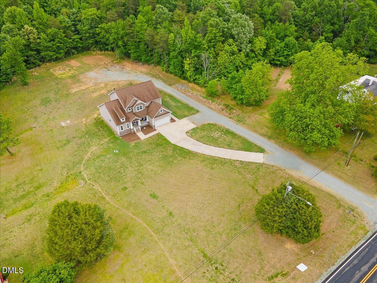 704 Haw River Hopedale Road Burlington, NC 27217 - Photo 42 of 49 a view of a swimming pool with an outdoor seating and yard