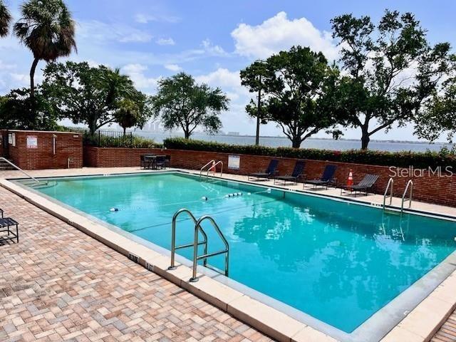 4015 Bayshore Boulevard, Unit 15A Tampa, FL 33611 - Photo 24 of 28 a view of a pool with a yard