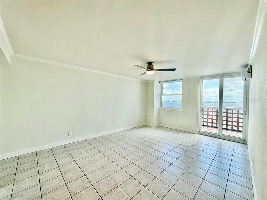 4015 Bayshore Boulevard, Unit 15A Tampa, FL 33611 - Photo 3 of 28 a view of an empty room and window
