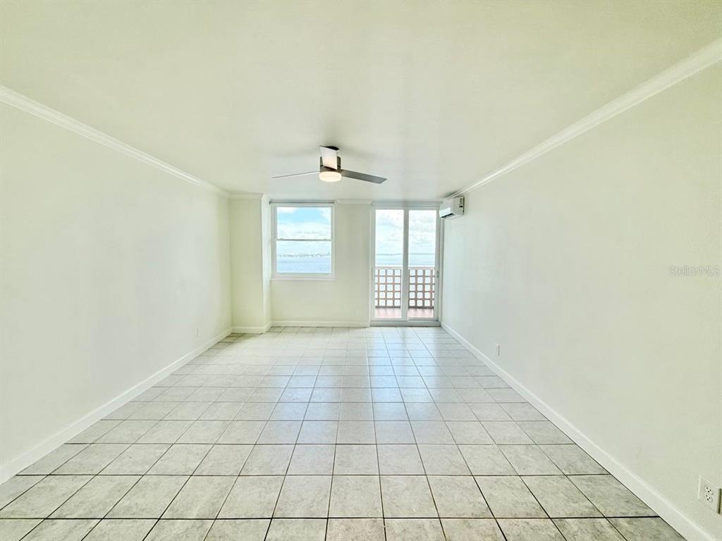 4015 Bayshore Boulevard, Unit 15A Tampa, FL 33611 - Photo 4 of 28 a view of an empty room with a window