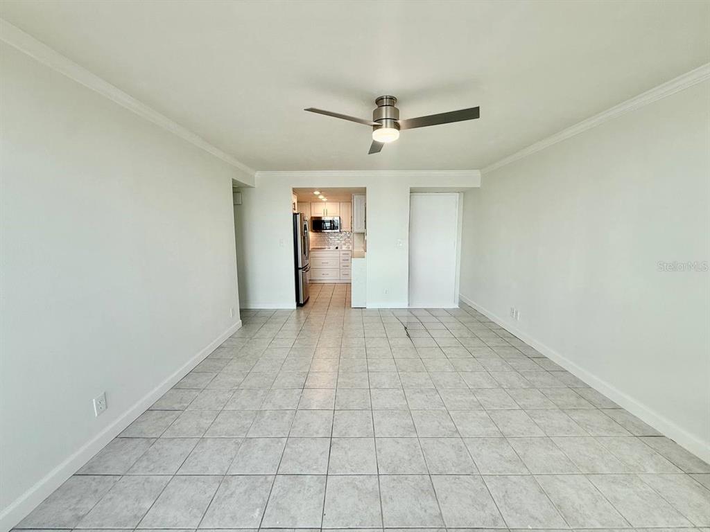 4015 Bayshore Boulevard, Unit 15A Tampa, FL 33611 - Photo 5 of 28 a view of empty room with a ceiling fan