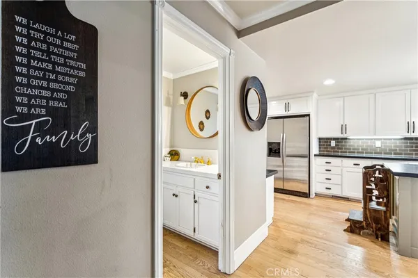 a kitchen with stainless steel appliances granite countertop a stove and a refrigerator