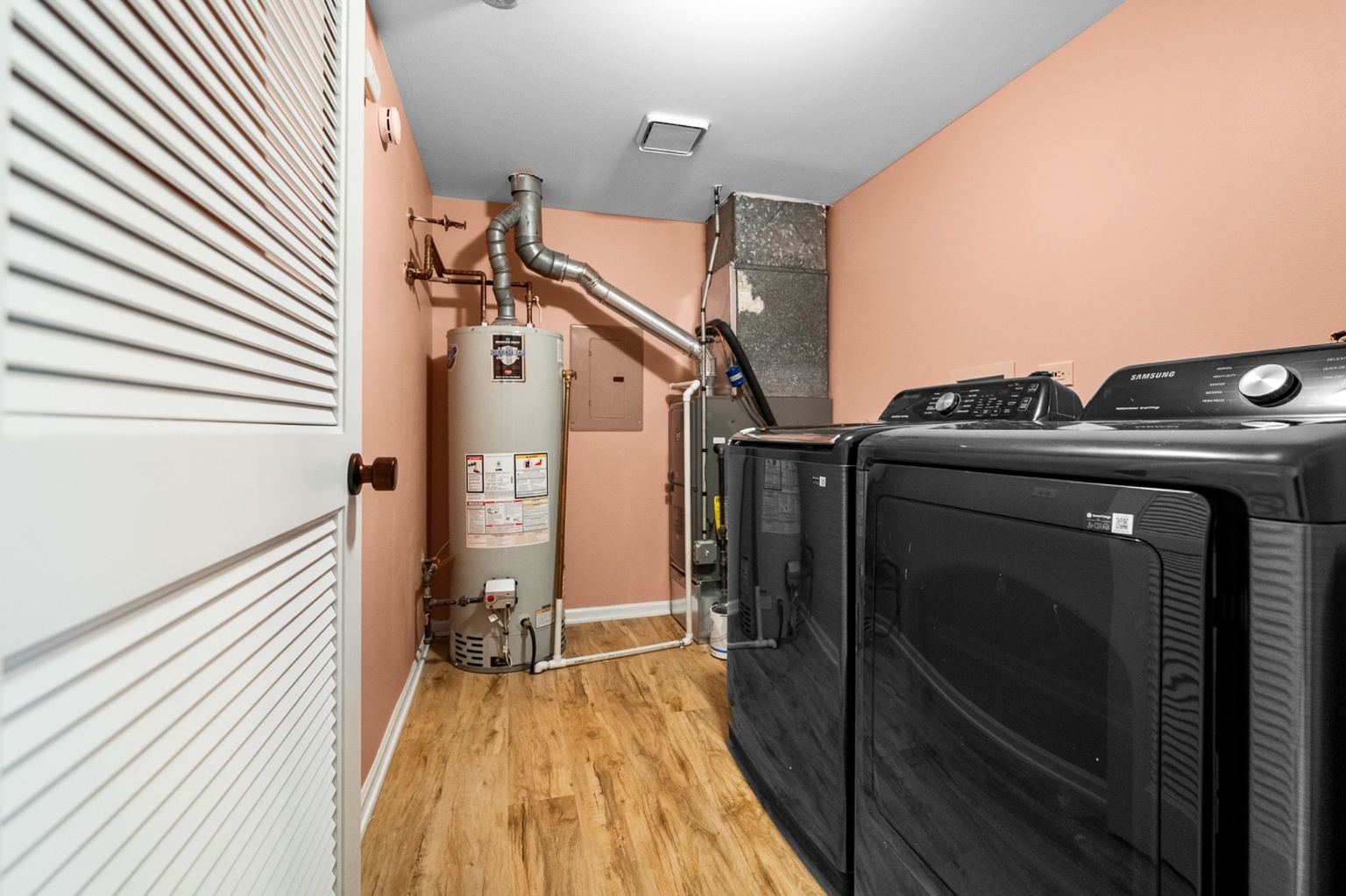 906 East Steger Road, Unit 5 Crete, IL 60417 - Photo 8 of 19 a view of a balcony with wooden floor