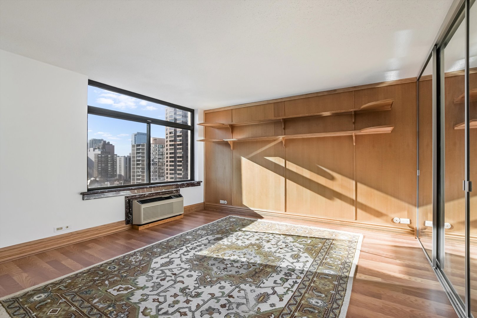 1450 North Astor Street, Unit 15AB Chicago, IL 60610 - Photo 15 of 23 a view of an empty room with a window