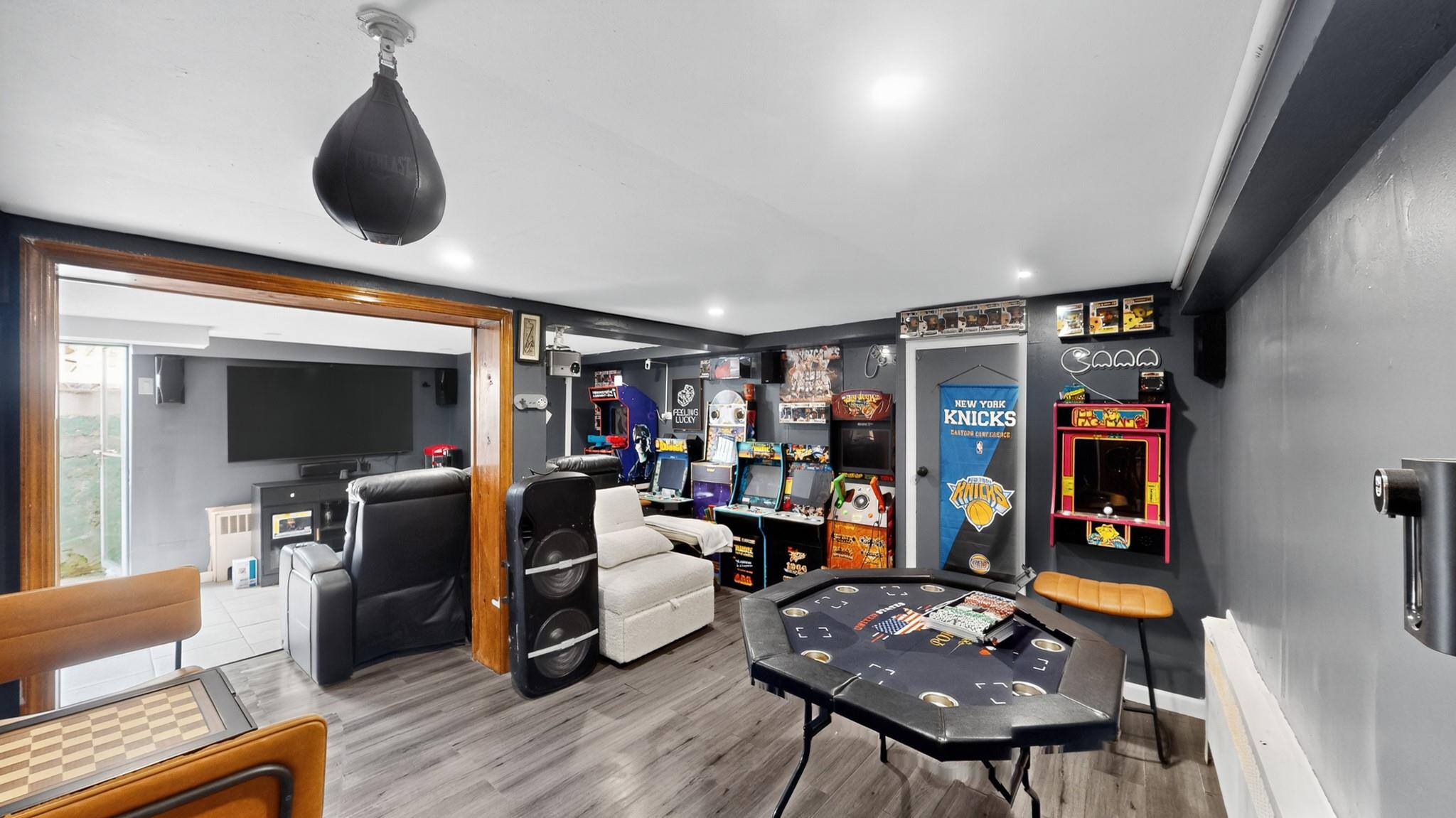 1332 A Street Elmont, NY 11003 - Photo 13 of 19 a living room with furniture and a flat screen tv