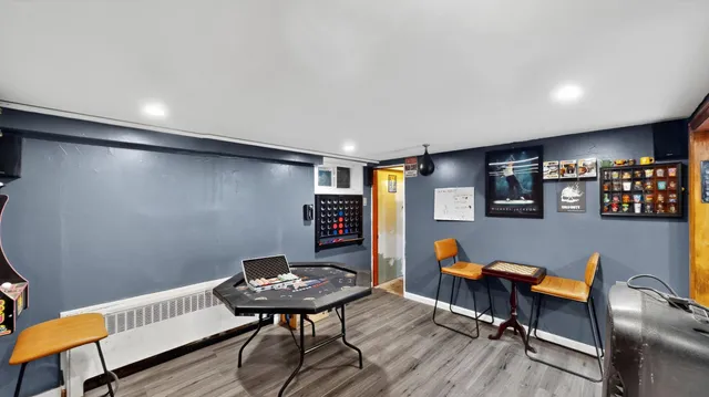 a view of a livingroom with furniture and a chair