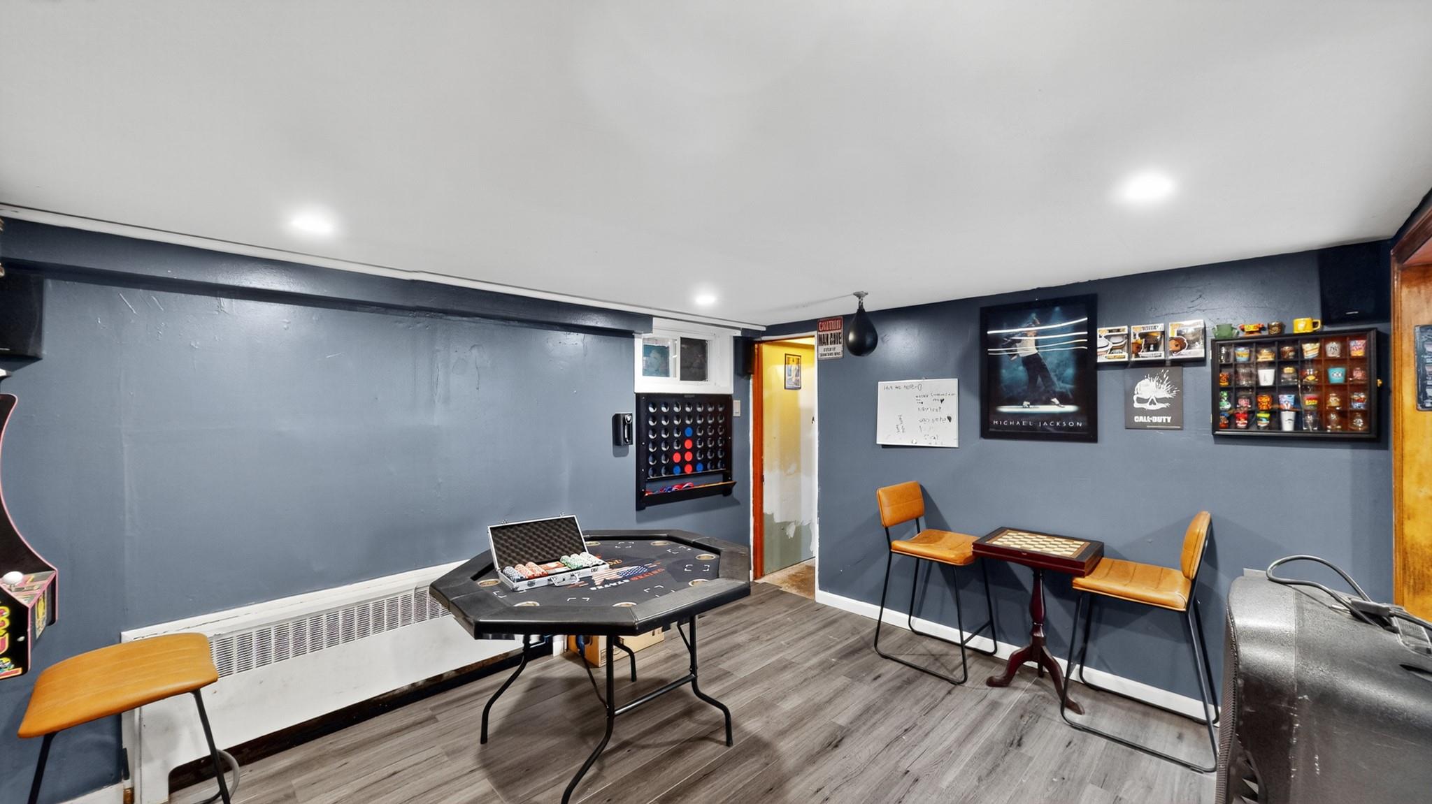 1332 A Street Elmont, NY 11003 - Photo 14 of 19 a view of a livingroom with furniture and a chair