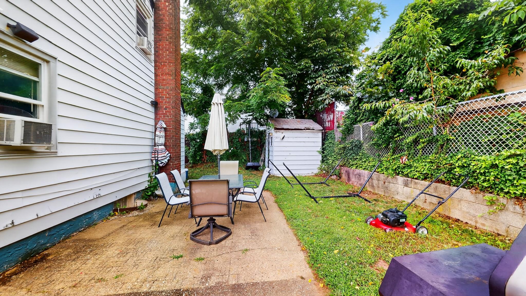 1332 A Street Elmont, NY 11003 - Photo 18 of 19 a garden view with a seating space