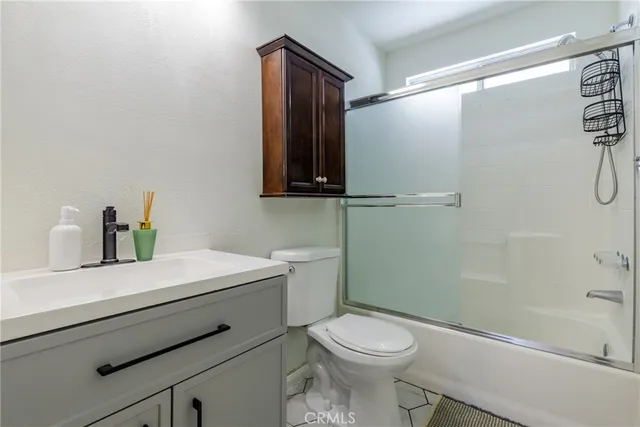 a view of a swimming pool and patio