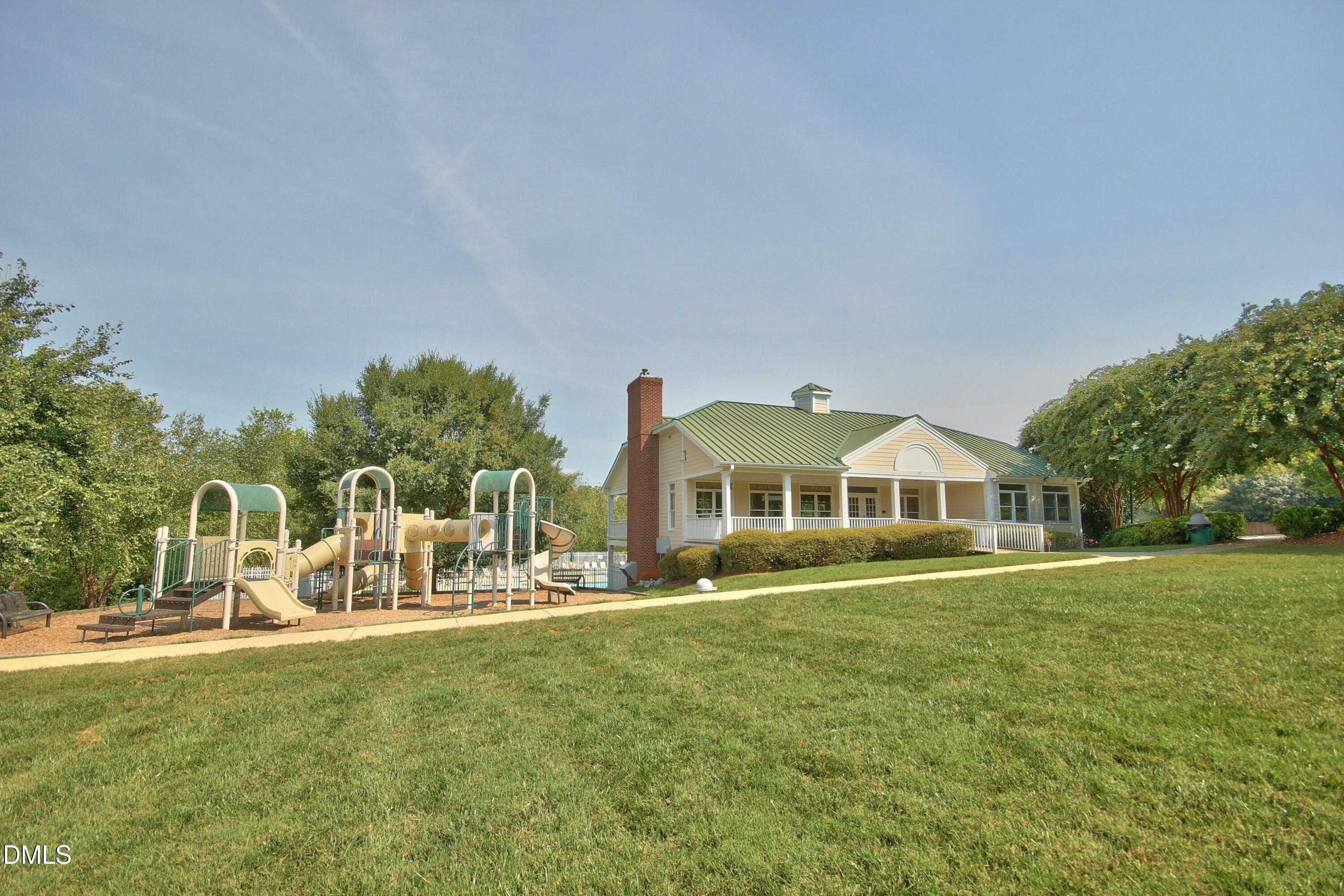 300 Lake Manor Road Chapel Hill, NC 27516 - Photo 88 of 99 a front view of a house with a yard