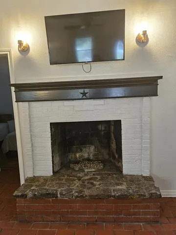 a living room with a fireplace