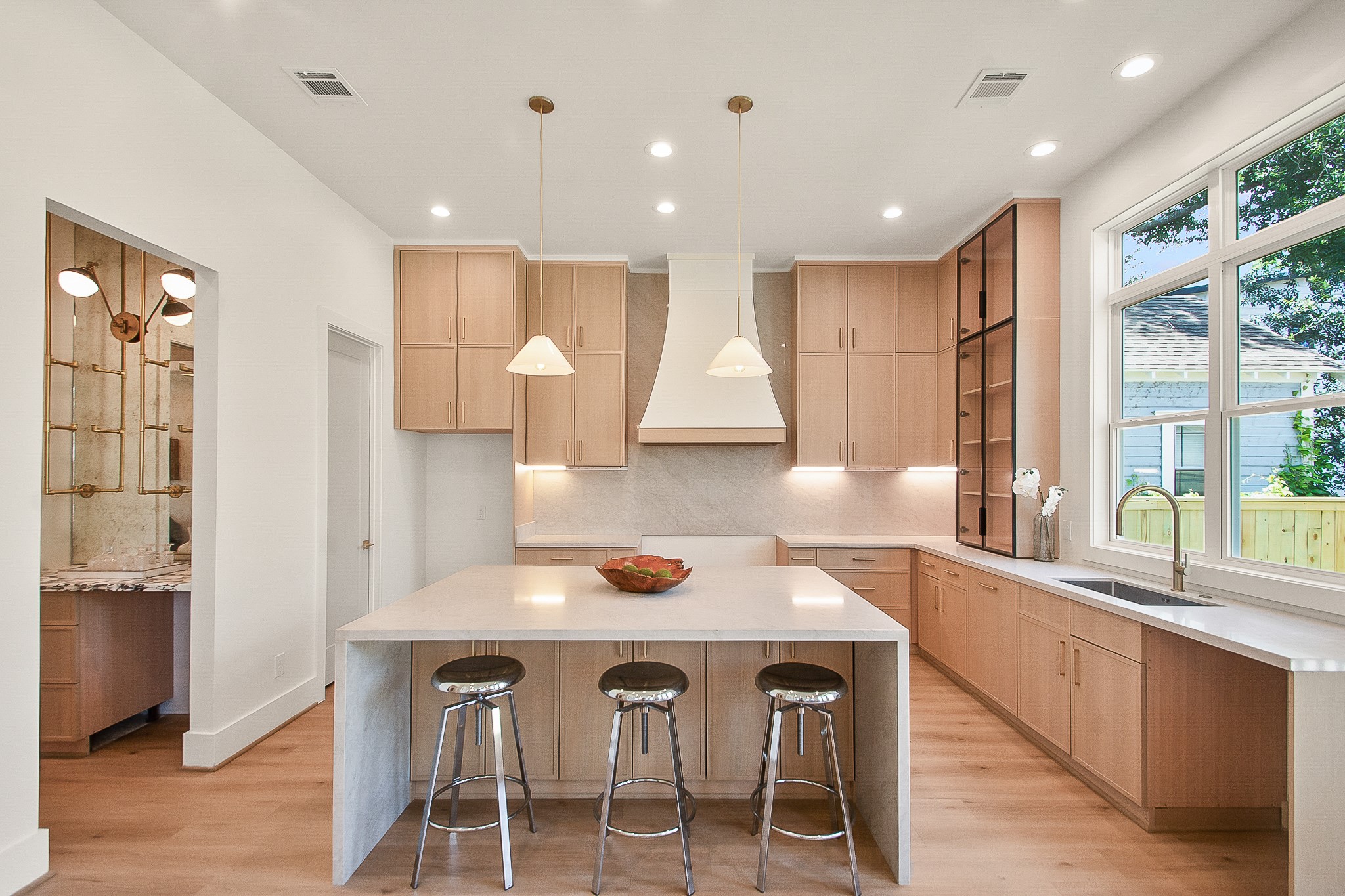 1109 Tabor Street Houston, TX 77009 - Photo 3 of 38 a kitchen with a sink cabinets and window