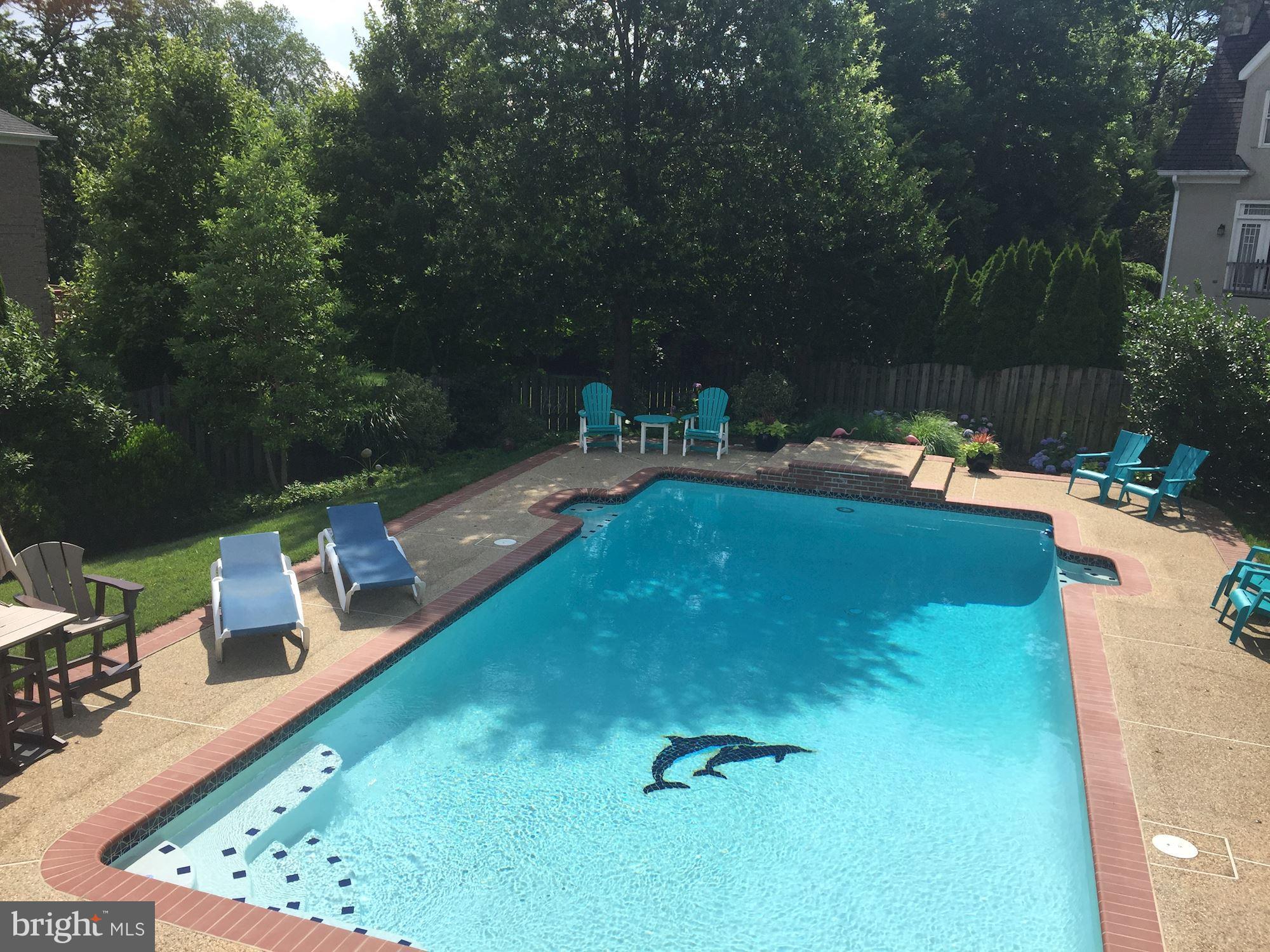 1651 Kirby Road McLean, VA 22101 - Photo 3 of 36 Backyard with pool & lush landscaping