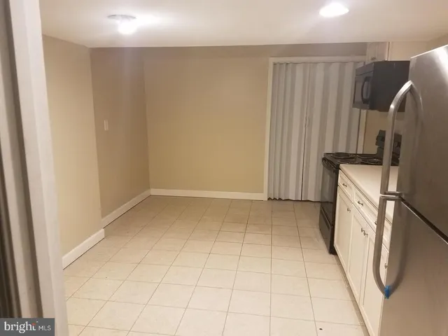 a view of a storage & utility room with washer and dryer