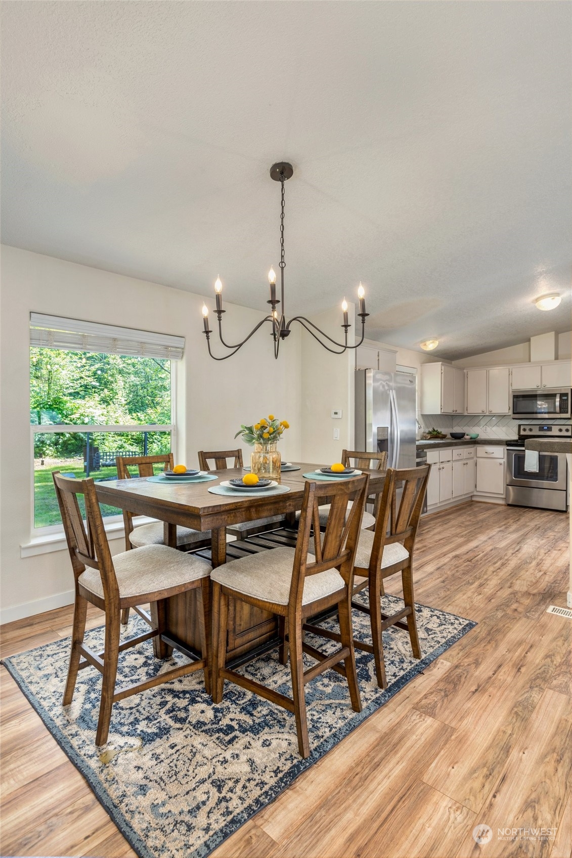7942 Crockett Road Blaine, WA 98230 - Photo 15 of 33 a dining room filled a table and chairs