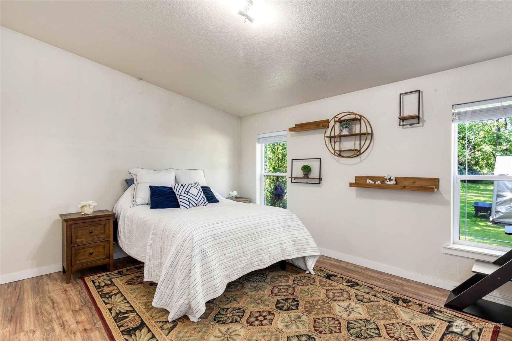 7942 Crockett Road Blaine, WA 98230 - Photo 19 of 33 a bedroom with a bed and a window
