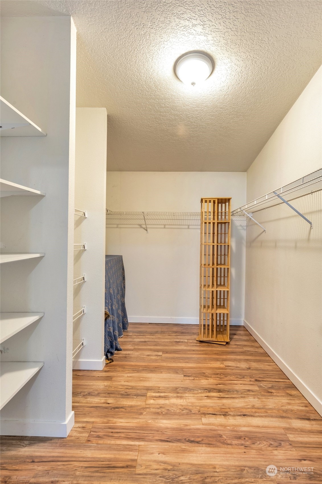 7942 Crockett Road Blaine, WA 98230 - Photo 20 of 33 a view of a room with wooden floor