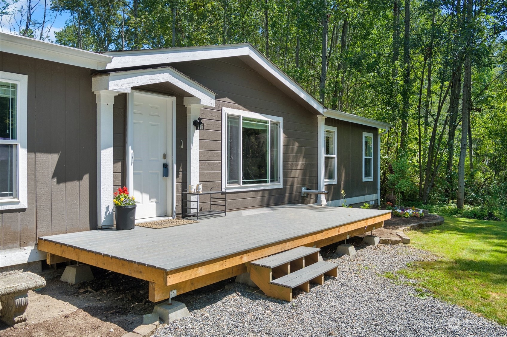 7942 Crockett Road Blaine, WA 98230 - Photo 2 of 33 a view of an house with backyard space and balcony