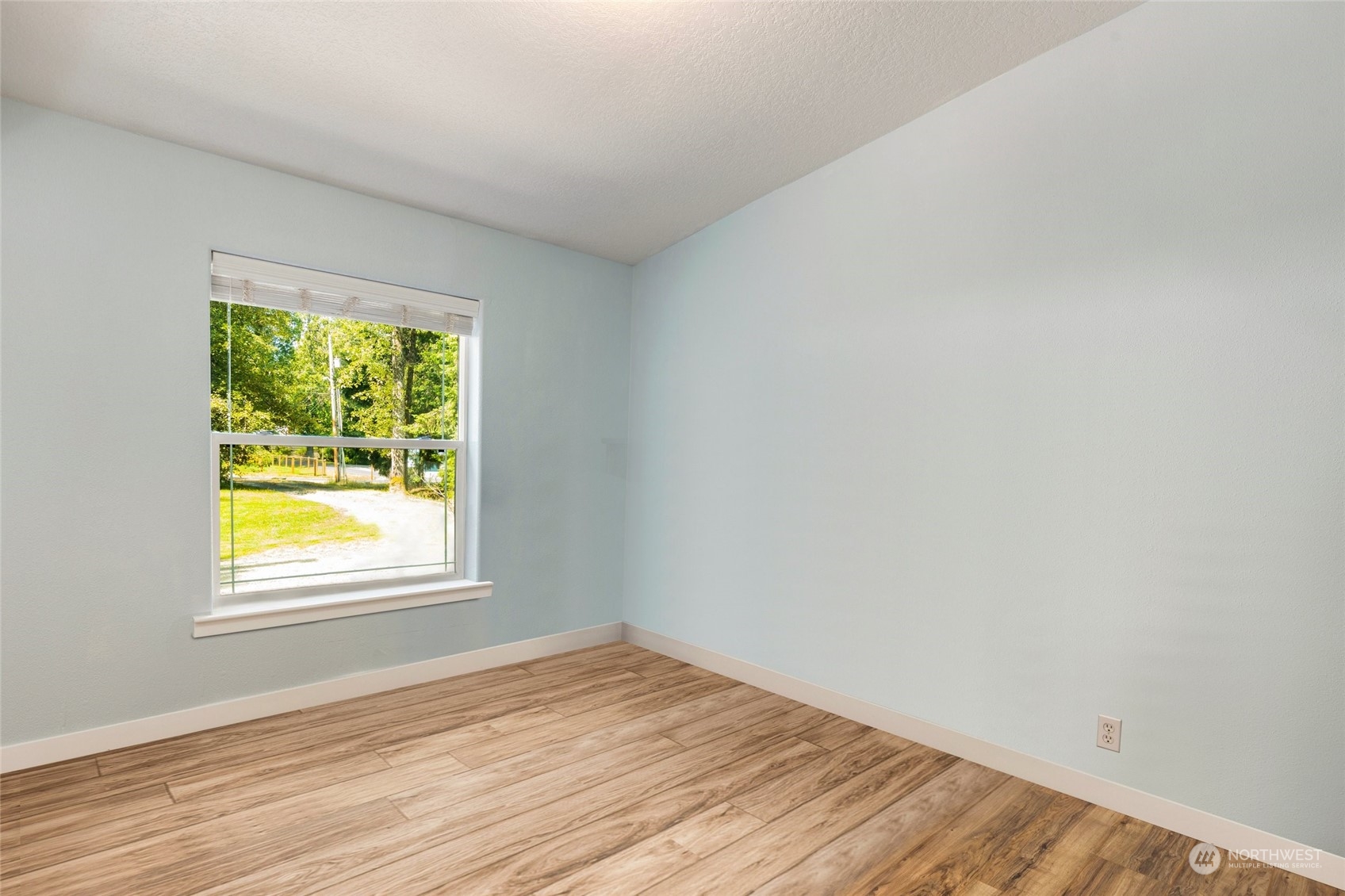 7942 Crockett Road Blaine, WA 98230 - Photo 23 of 33 an empty room with a window