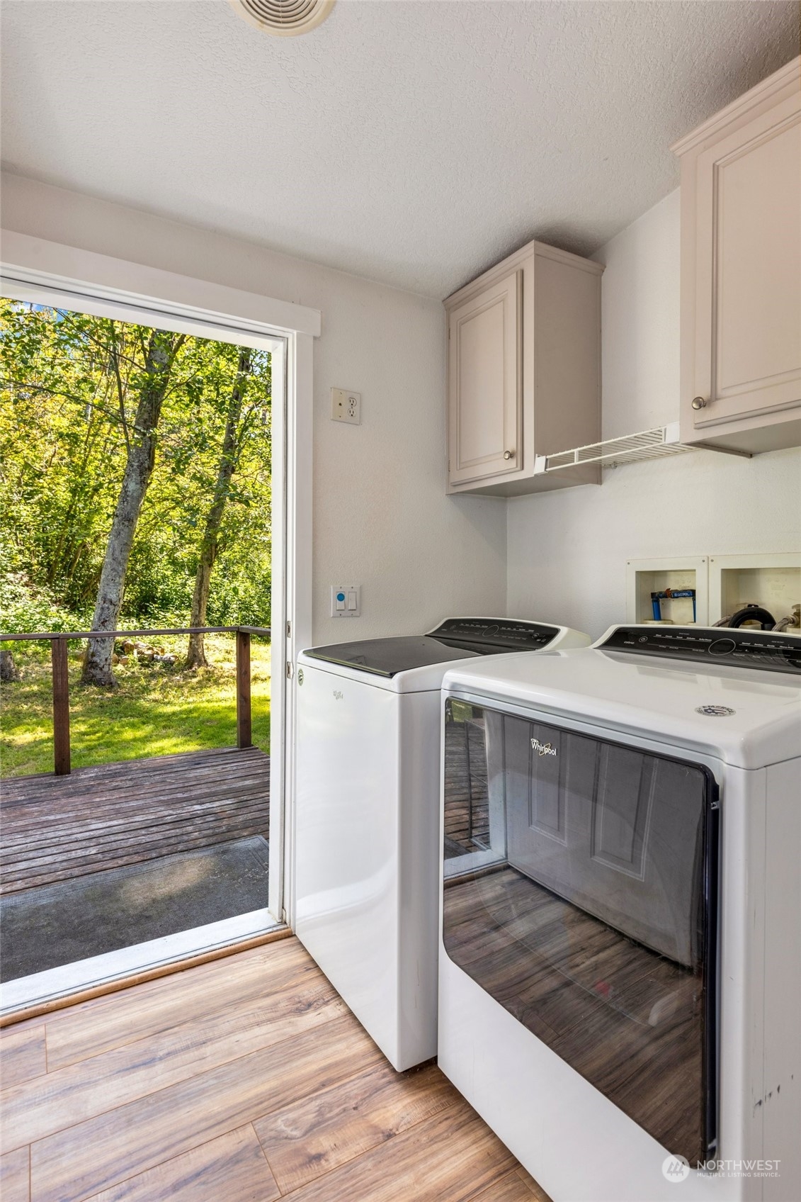 7942 Crockett Road Blaine, WA 98230 - Photo 25 of 33 a kitchen view with wooden floor and a window