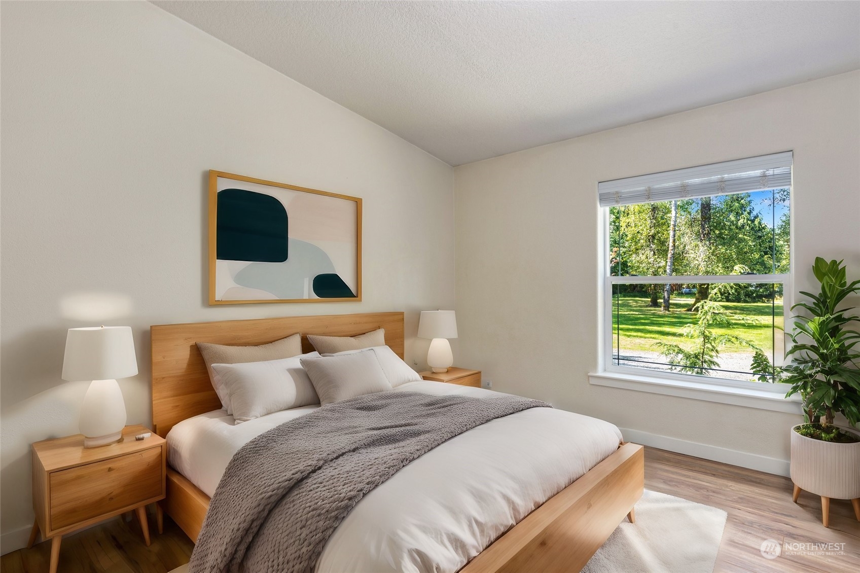 7942 Crockett Road Blaine, WA 98230 - Photo 30 of 33 a bedroom with a bed and a window