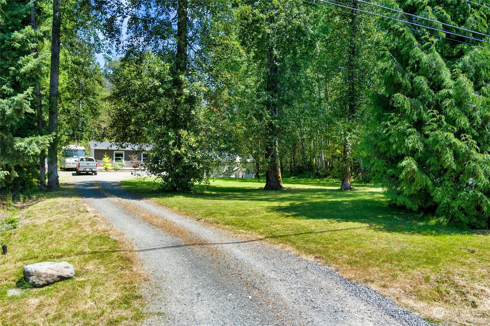 7942 Crockett Road Blaine, WA 98230 - Photo 4 of 33 a view of a yard with plants and trees