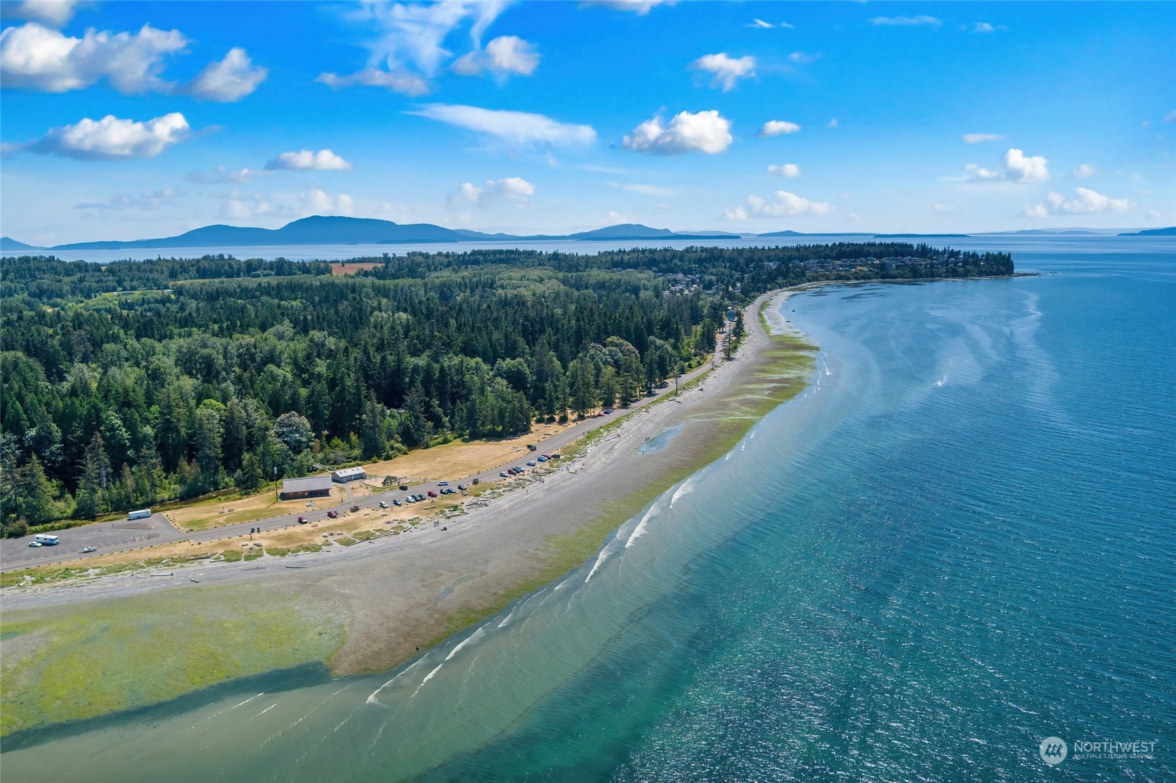 7942 Crockett Road Blaine, WA 98230 - Photo 6 of 33 a view of a lake with a mountain