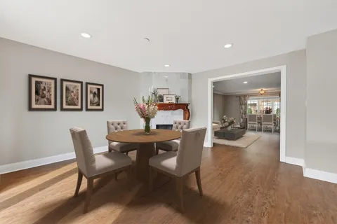 a kitchen with stainless steel appliances granite countertop a sink and a stove