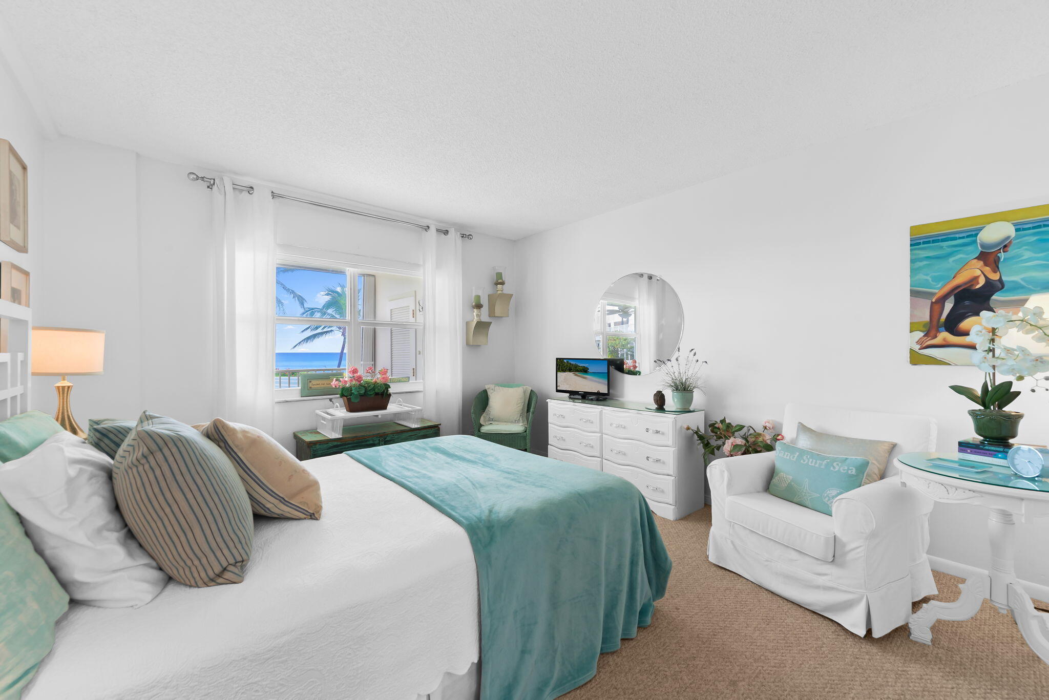 3101 South Ocean Boulevard, Unit 102 Highland Beach, FL 33487 - Photo 14 of 19 a bedroom with furniture and a window