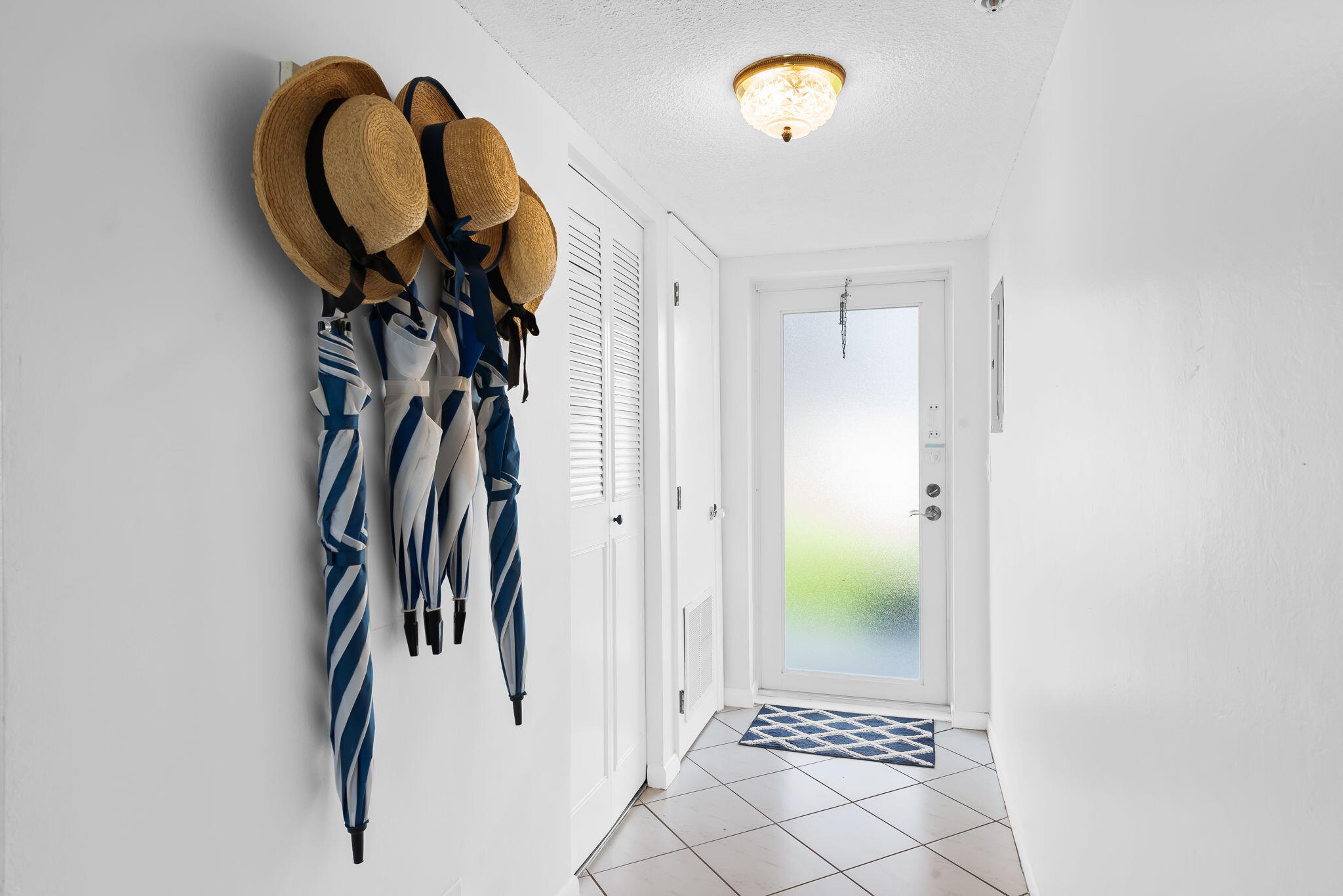 3101 South Ocean Boulevard, Unit 102 Highland Beach, FL 33487 - Photo 3 of 19 a view of a hallway with painted walls