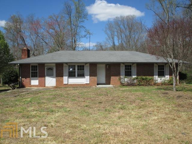 6211 Mt Zion Road Waco, GA 30182 - Photo 1 of 1 a front view of a house with garden