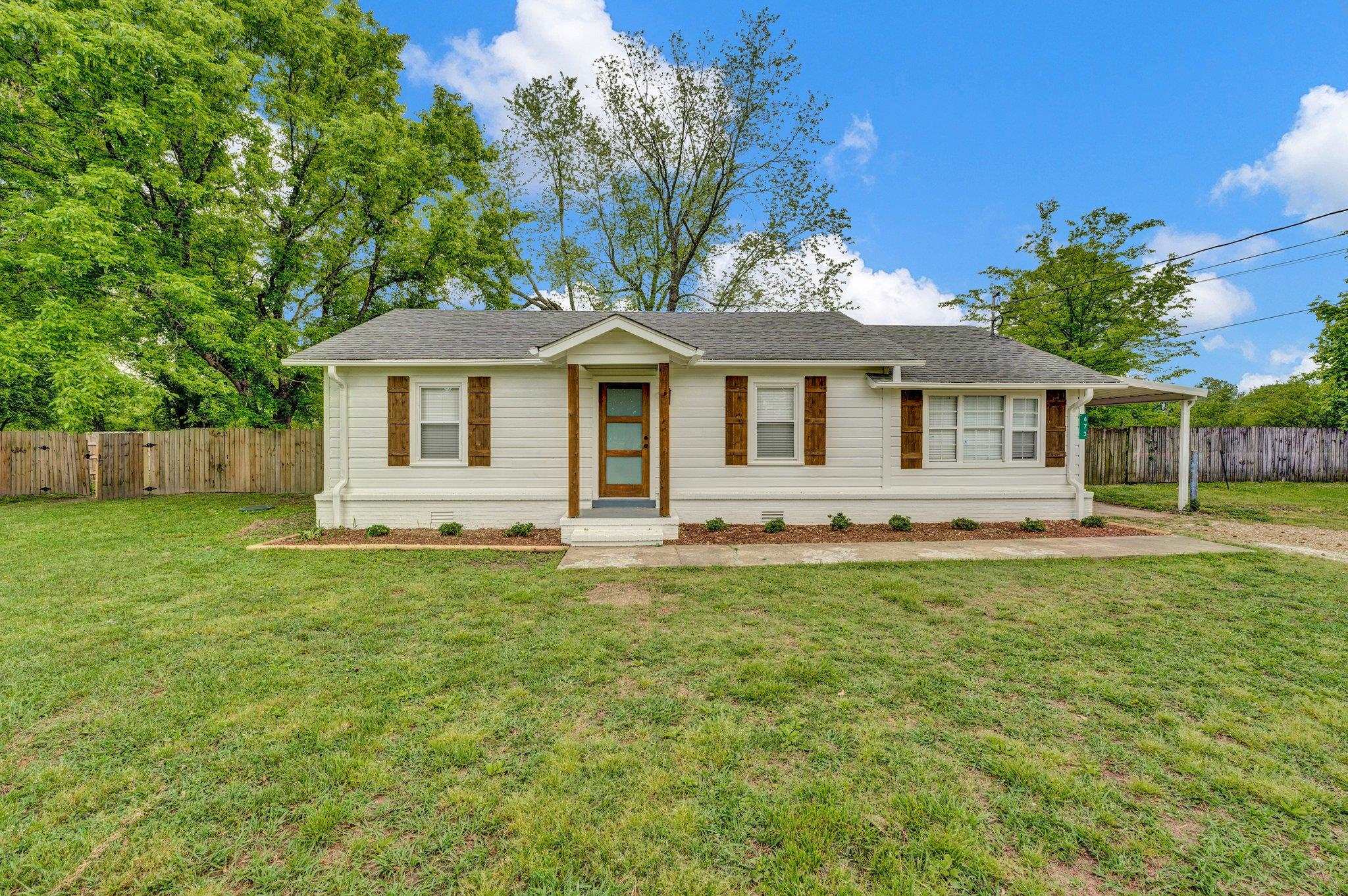673 Watson Road Munford, TN 38058 - Photo 1 of 1 Ranch-style home featuring a shingled roof