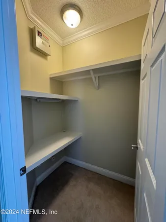 a bathroom with a shower and a sink