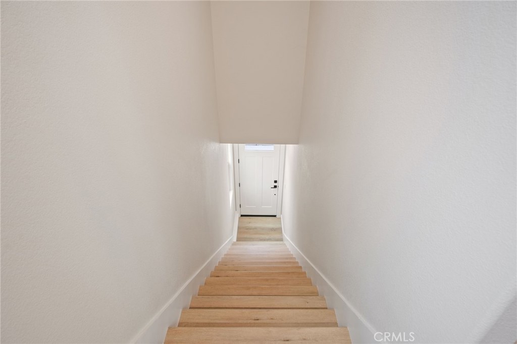 243 East 3rd Street Tracy, CA 95376 - Photo 18 of 29 a view of a hallway with wooden floor
