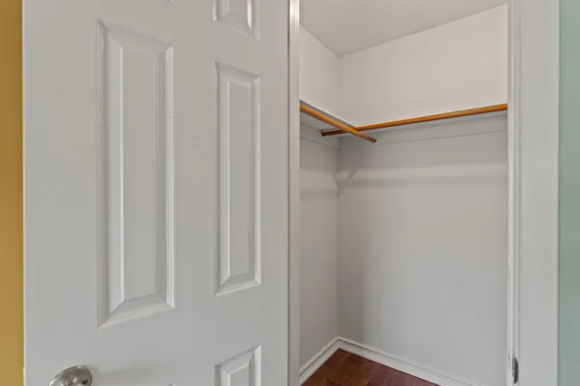a bathroom with a sink a toilet and shower curtain