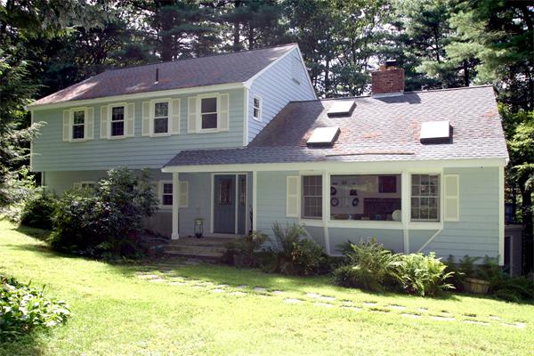 8 Longfellow Road Wayland, MA 01778 - Photo 1 of 24 a view of a house with a garden