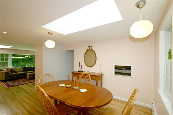 8 Longfellow Road Wayland, MA 01778 - Photo 11 of 24 a view of a dining room with furniture wooden floor and a chandelier