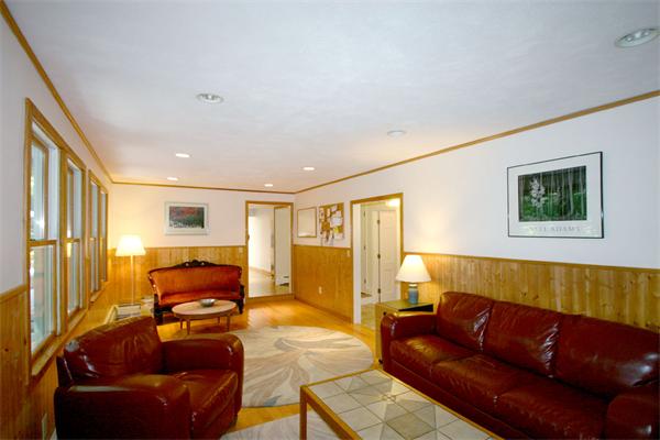 8 Longfellow Road Wayland, MA 01778 - Photo 13 of 24 a living room with furniture and a couch