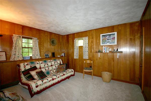 8 Longfellow Road Wayland, MA 01778 - Photo 15 of 24 a bedroom with furniture and a window