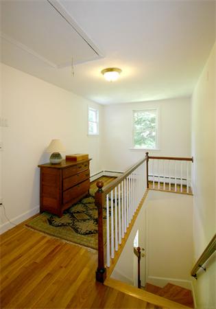 8 Longfellow Road Wayland, MA 01778 - Photo 16 of 24 a view of a room with wooden floor