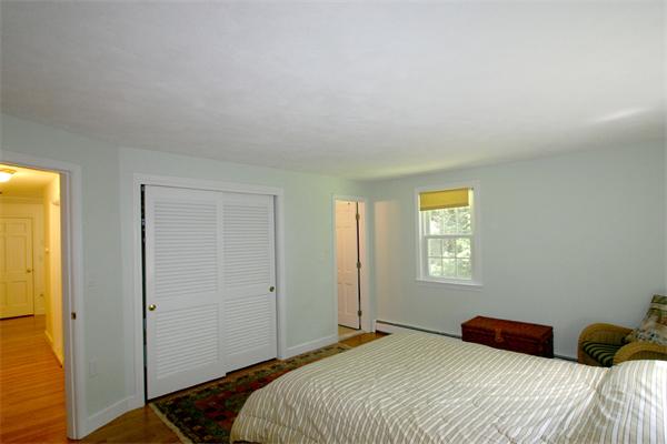 8 Longfellow Road Wayland, MA 01778 - Photo 17 of 24 a bedroom with a bed and a window