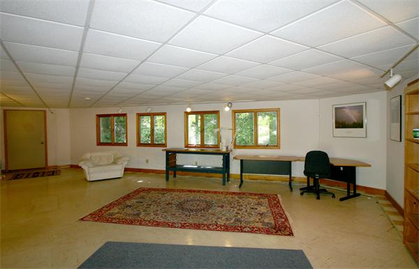 8 Longfellow Road Wayland, MA 01778 - Photo 20 of 24 a bedroom with furniture and a window