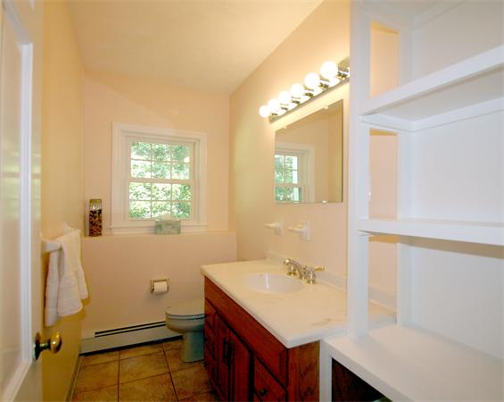 8 Longfellow Road Wayland, MA 01778 - Photo 22 of 24 a bathroom with a sink and a mirror