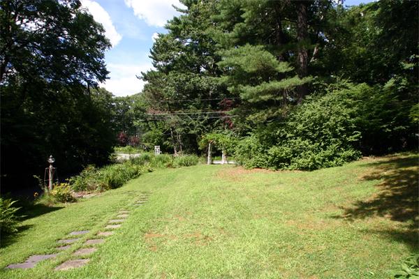 8 Longfellow Road Wayland, MA 01778 - Photo 24 of 24 a view of a yard with a tree