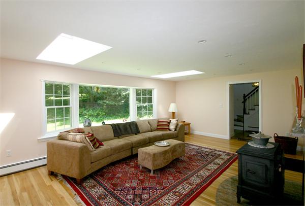 8 Longfellow Road Wayland, MA 01778 - Photo 6 of 24 a living room with furniture and a window