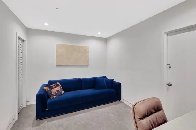 a living room with furniture and a couch