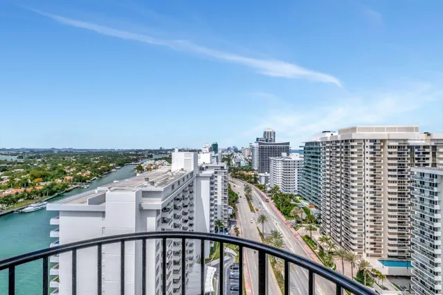 a view of a city with tall buildings